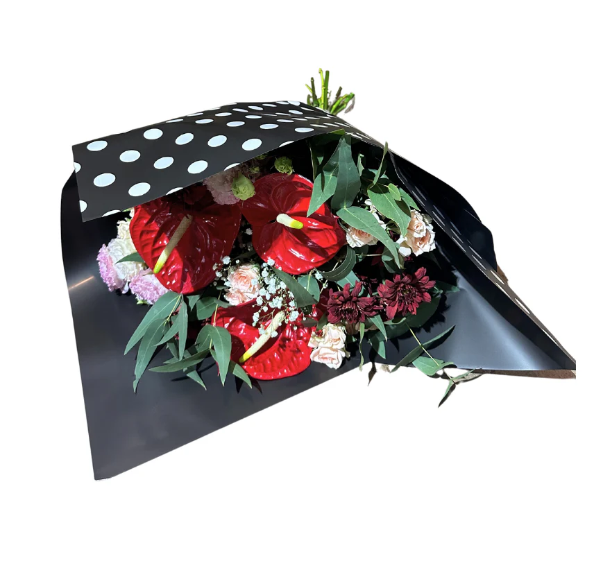 Emballage cellophane pour fleurs : pois noirs et blancs (paquet de 20)